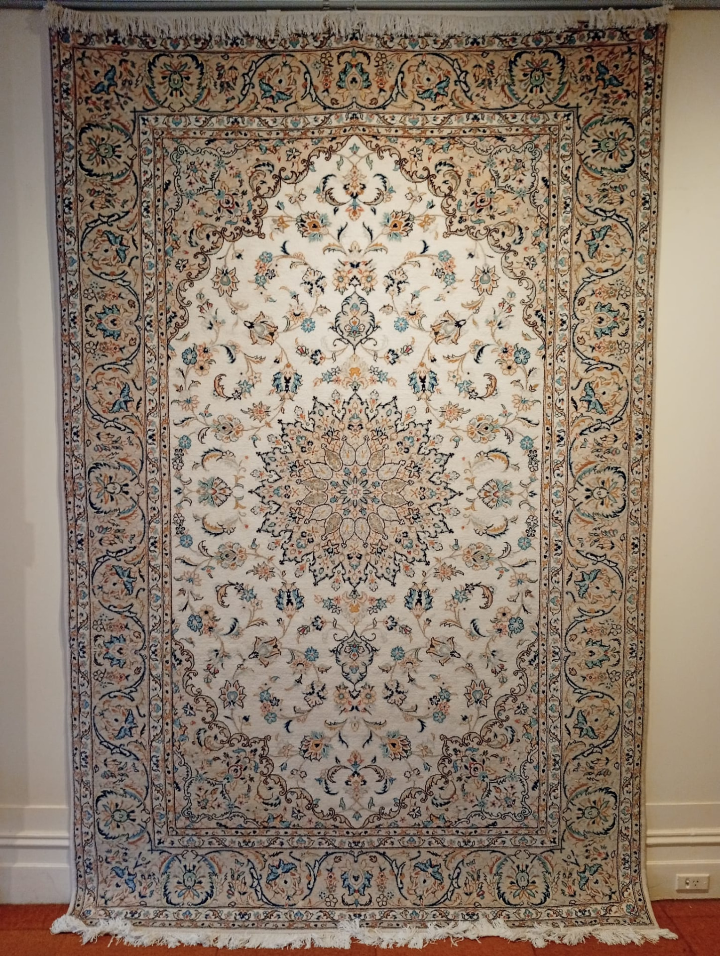 Hand-knotted Nain Persian rug with ivory field and pale blue floral medallion